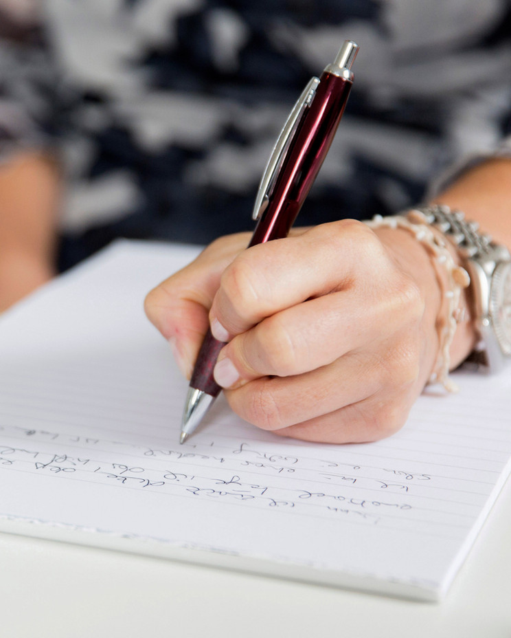Writing by hand during the Words and Wine workshop