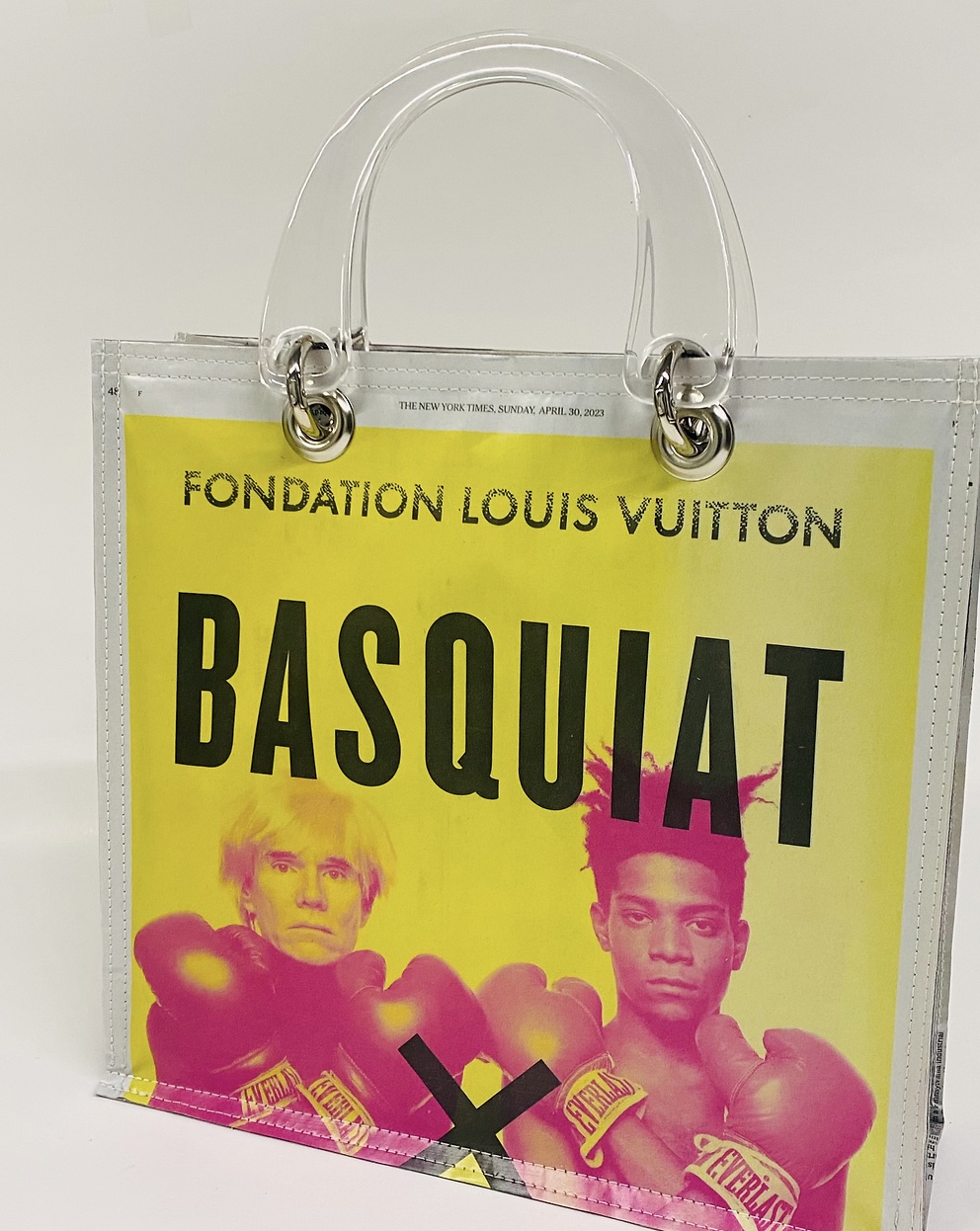 Clear tote bag made from a Fondation Louis Vuitton Basquiat exhibition poster, by Couture Planet