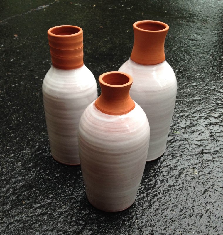 Three thrown ceramic vessels with terracotta rims, shown at Gallery 9