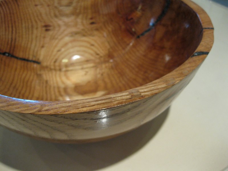 A turned ash bowl, shown at Gallery 9 in Norwood, Massachusetts